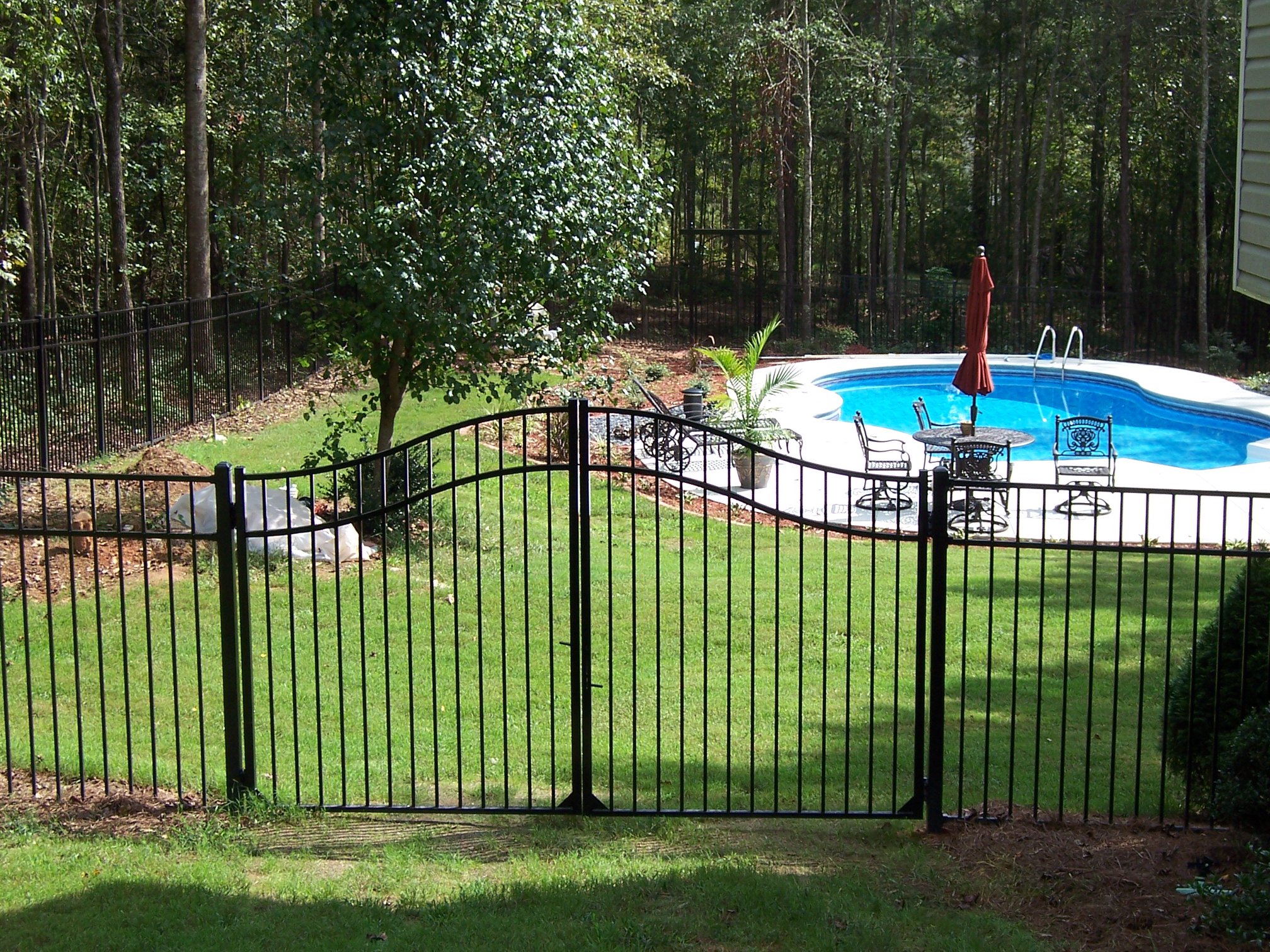 pool-safety-fence-installation-by-summit-fence-in atlanta rnamental steel spear top fence installation in Canton GA by Summit Fence